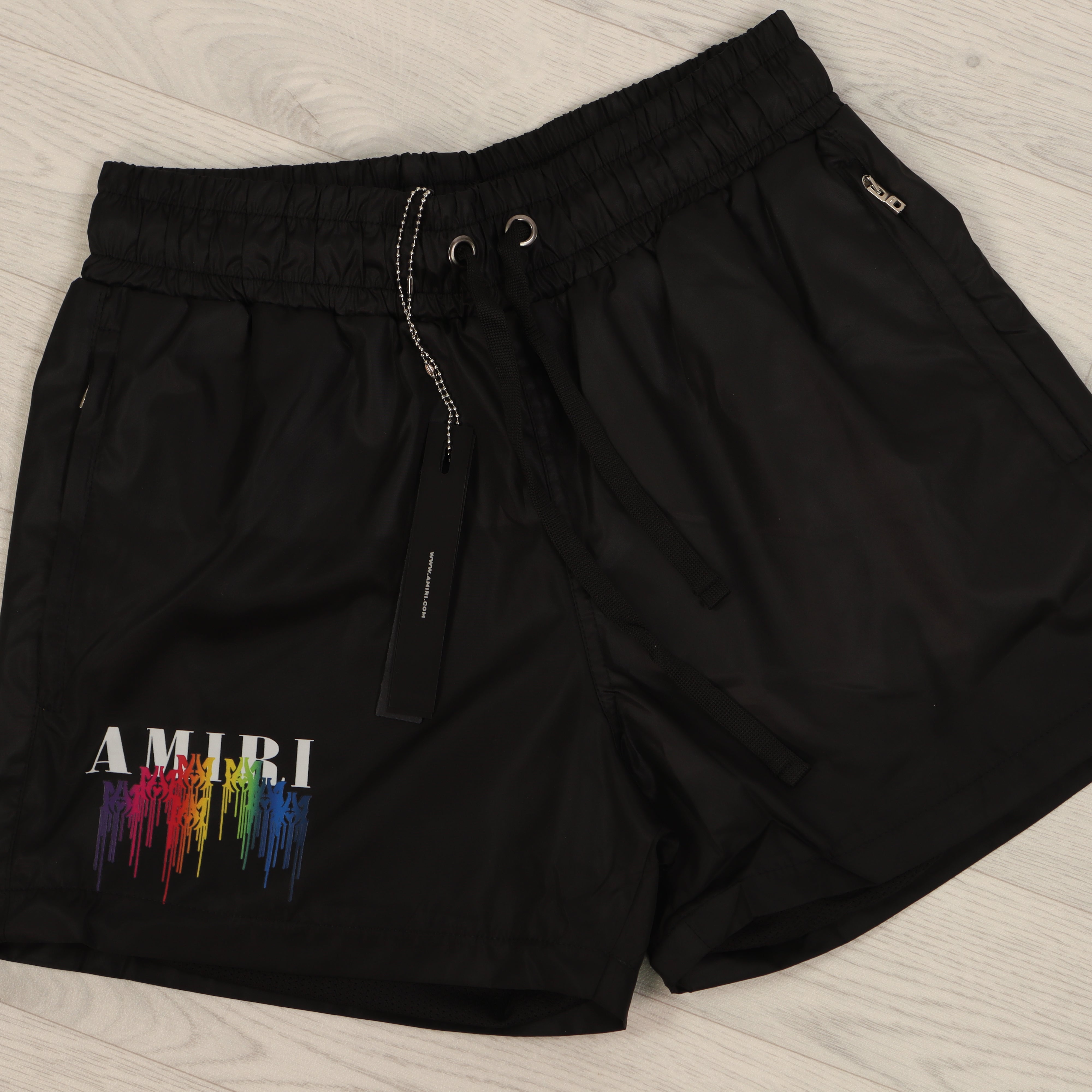 amiri paint drip shorts