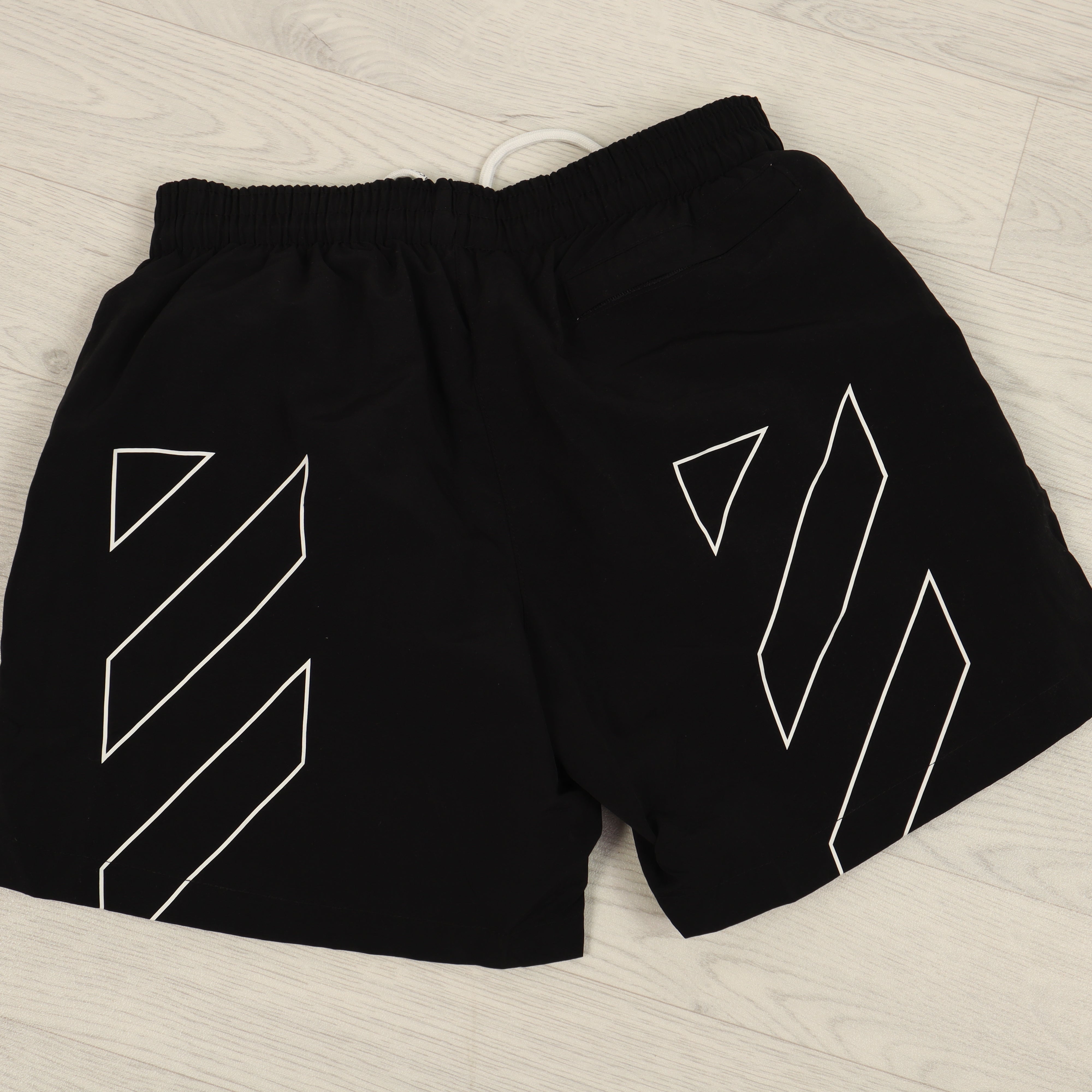 Black Diagonal Stripe Swims Shorts.