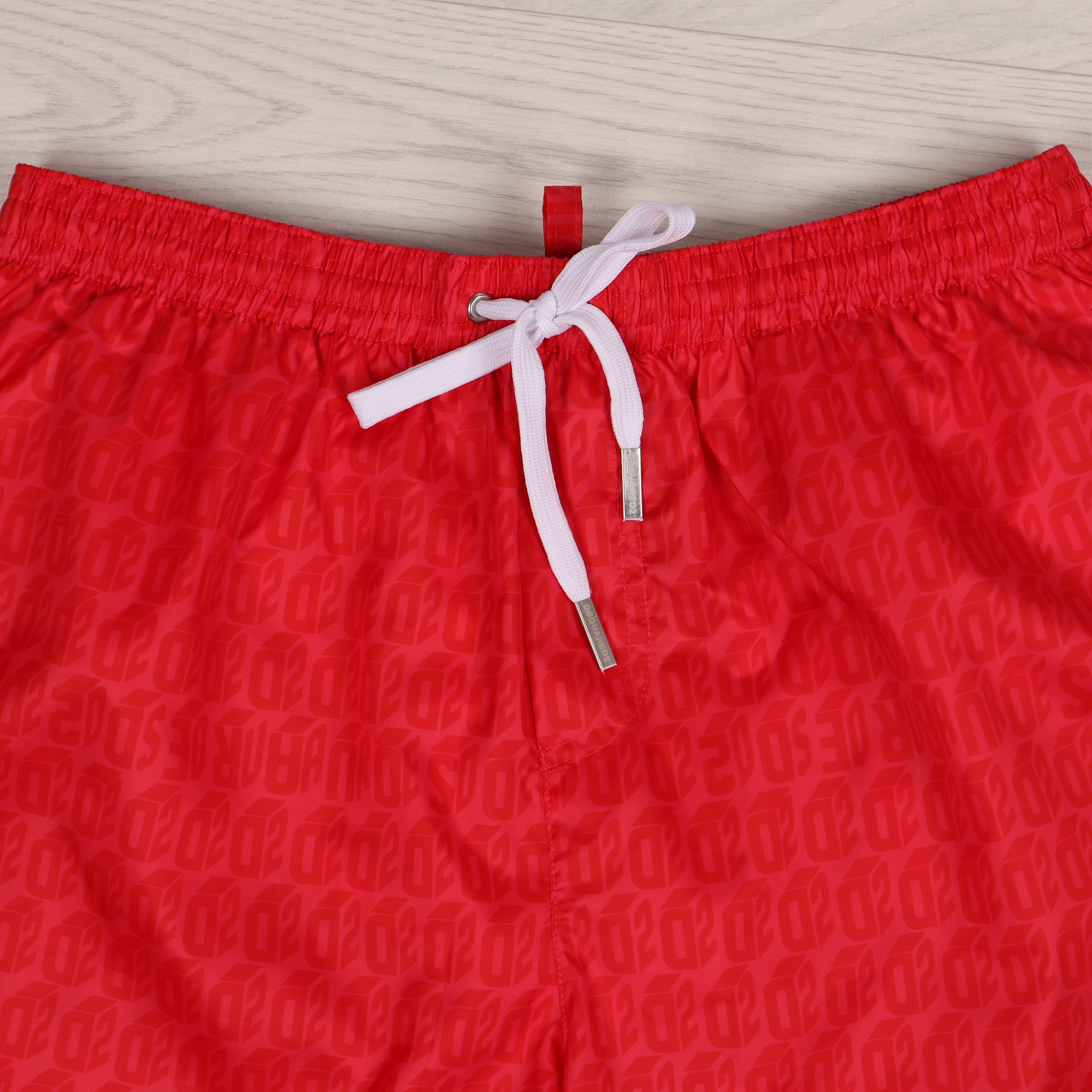 Red Monogram Swim Shorts.