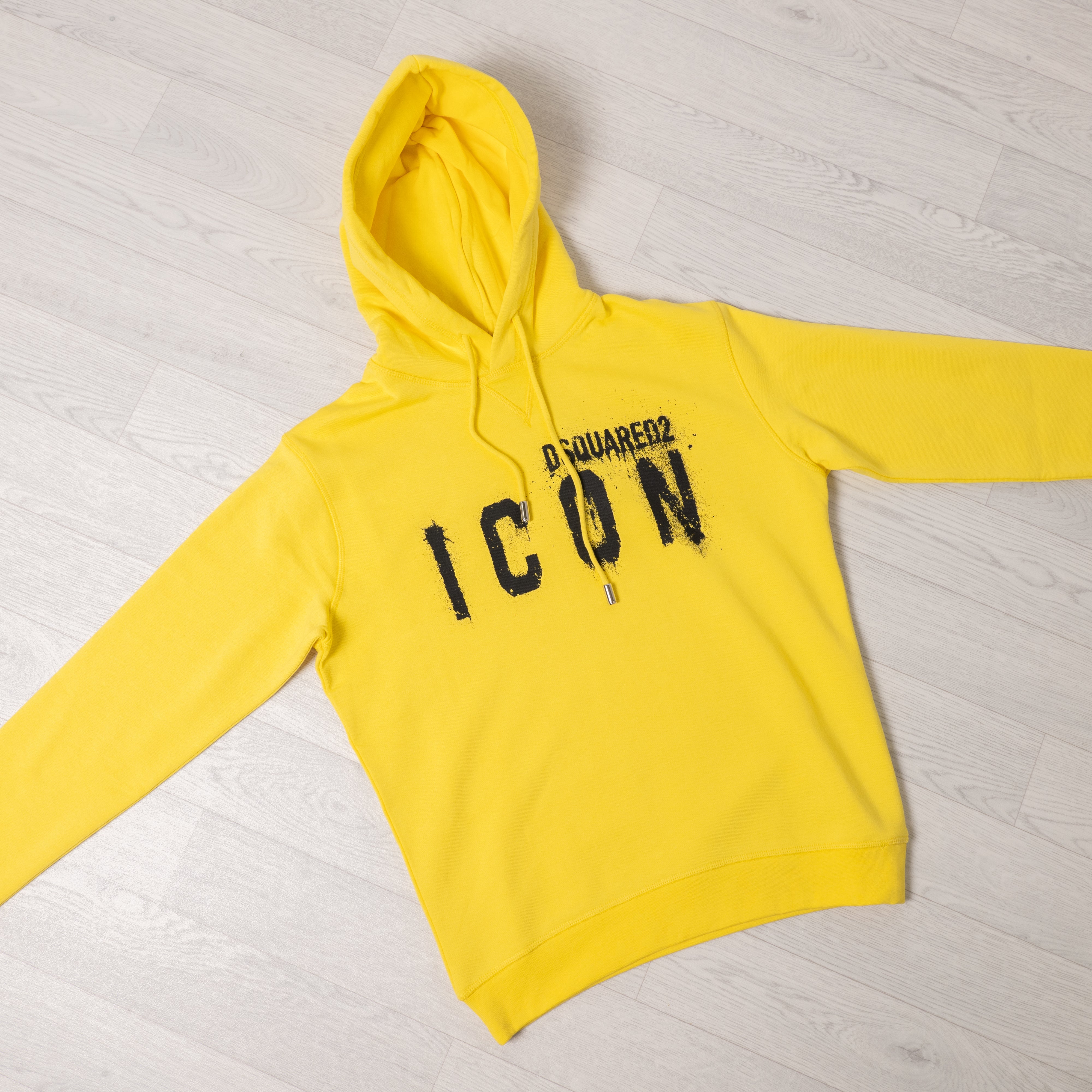 Yellow Icon Spray Hoodie.
